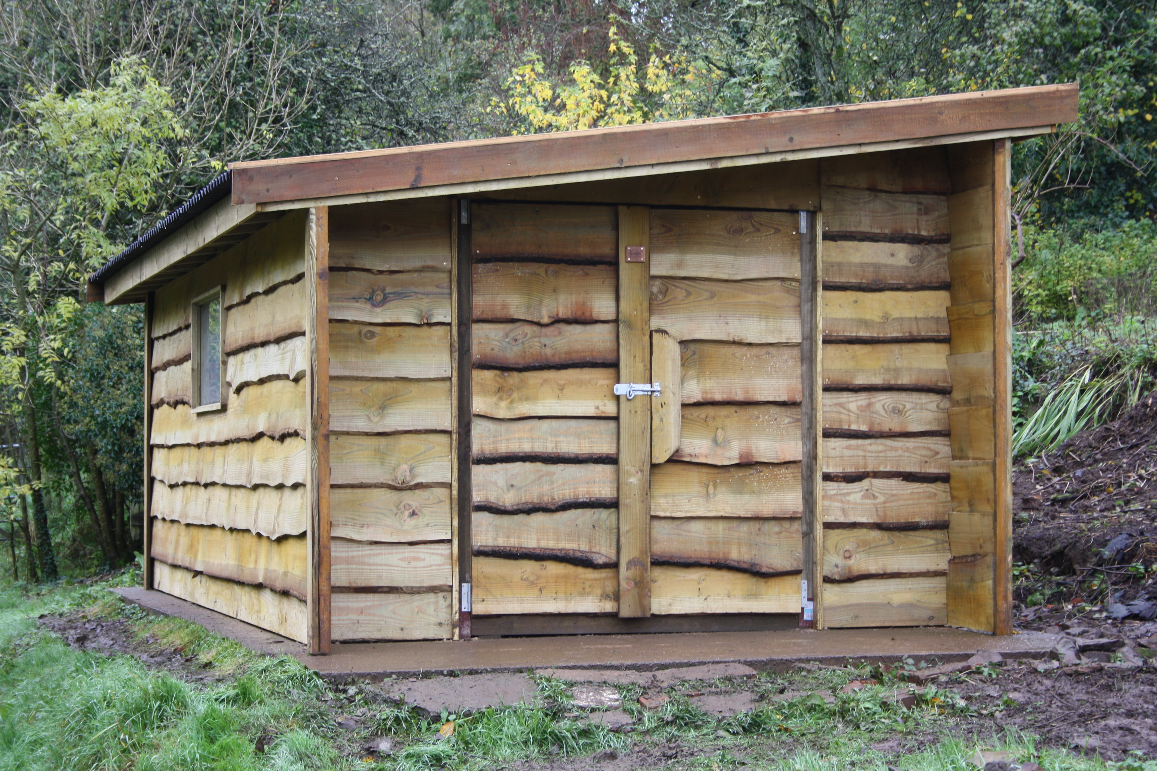 Waney edge rustic shed. | The Wooden Workshop | Oakford, Devon