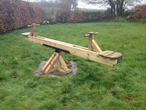 Timber playground seesaw. The Wooden Workshop, Bampton, Devon.