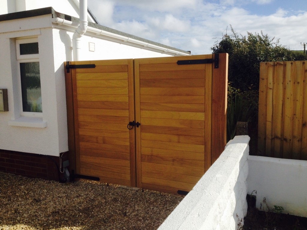 Iroko panelled gates, The Wooden Workshop. Oakford, Devon.