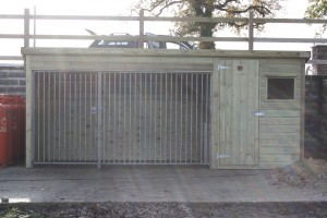 Timber dog kennel with galvanised run