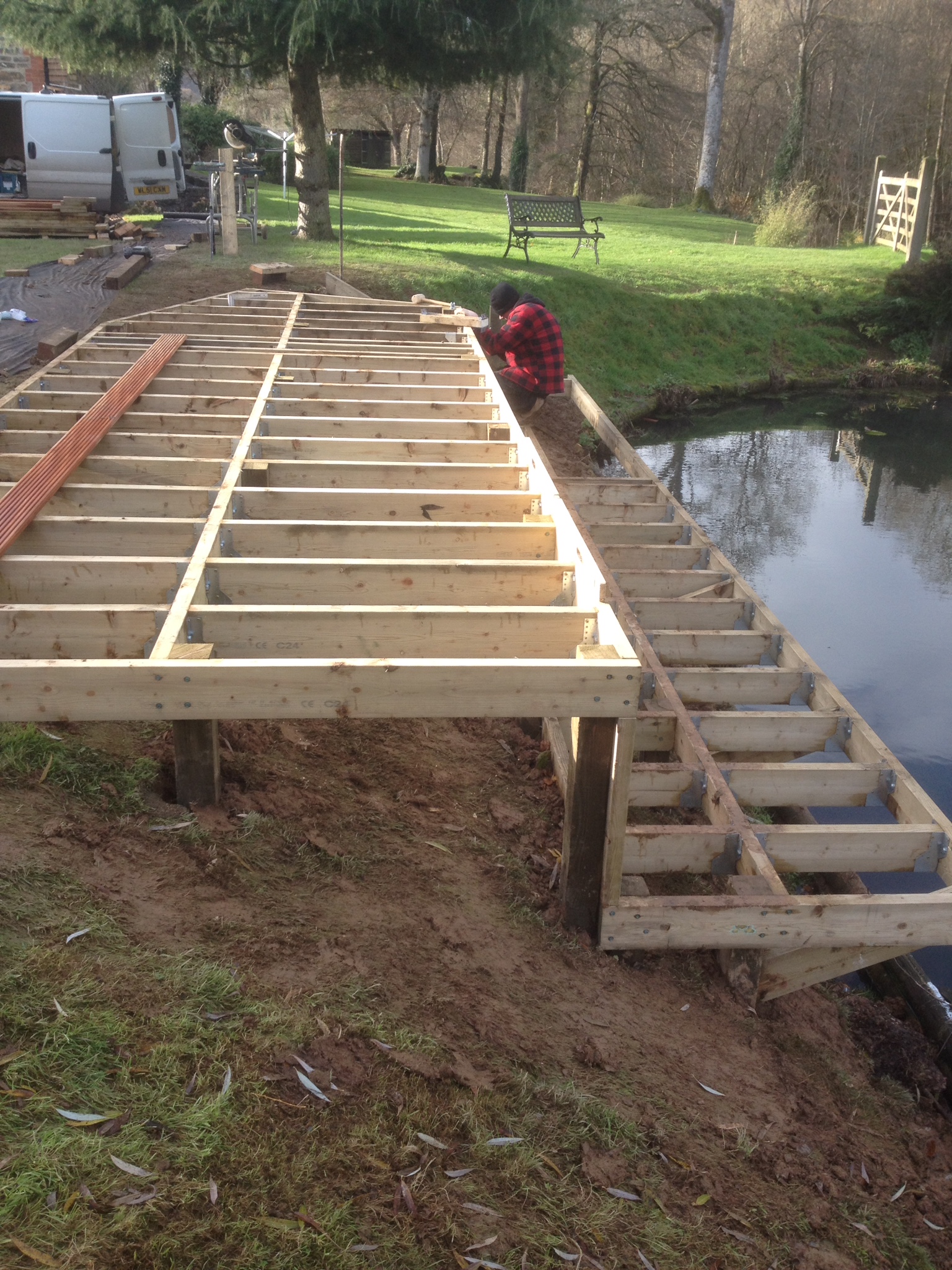timber framework for deck project by the lake