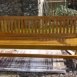 Idigbo wooden bench with engraving