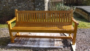 Idigbo wooden bench with engraving
