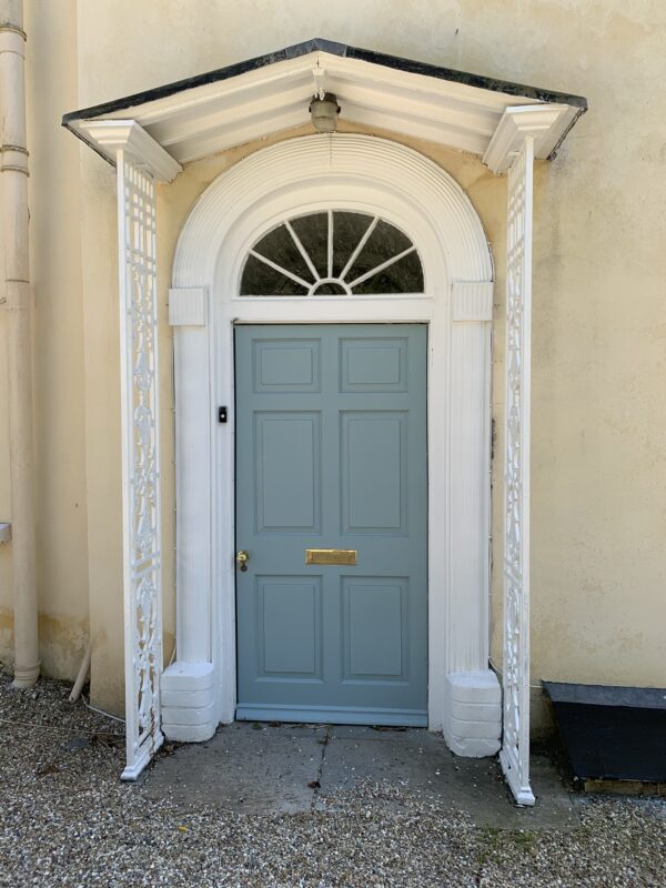 Front door constructed from Sapele and painted