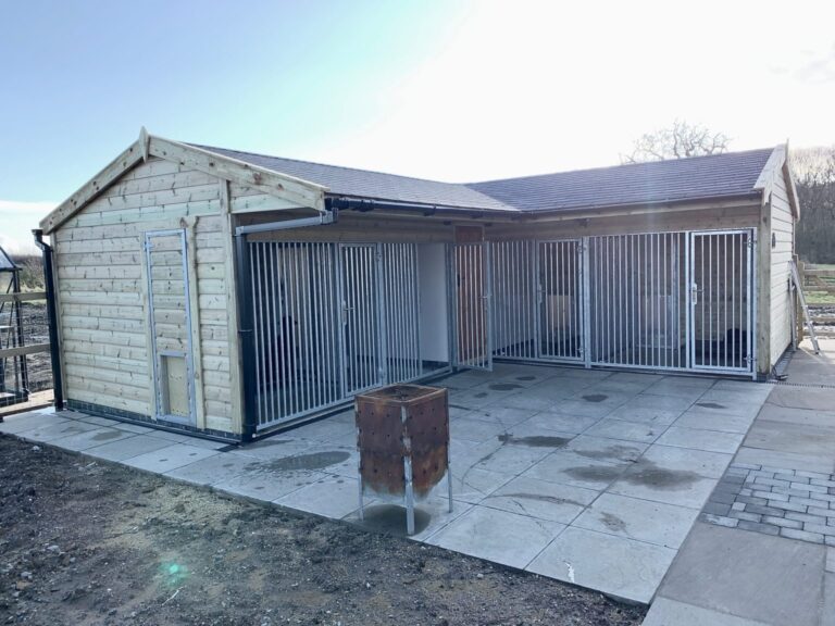 'L' shape dog kennels with galvanised panels