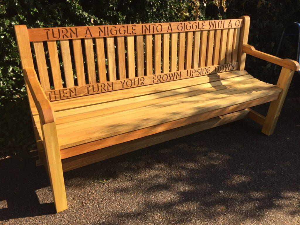 School playground bench with engraving