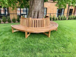 Oak round tree bench that fits around a tree trunk